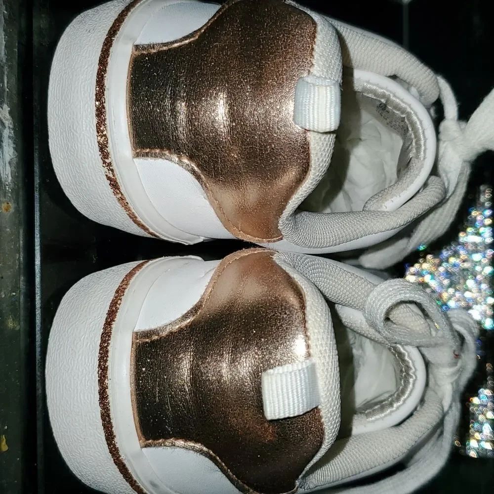 White leather rose gold sneakers